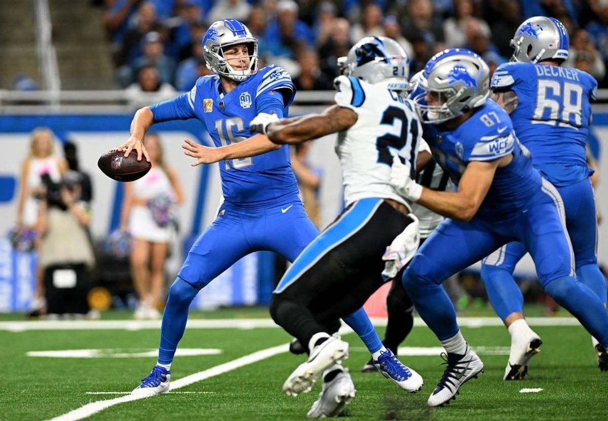 Oct 8, 2023; Detroit, Michigan, USA; Detroit Lions quarterback Jared Goff (16) throws a pass against the Carolina Panthers in the first quarter at Ford Field.