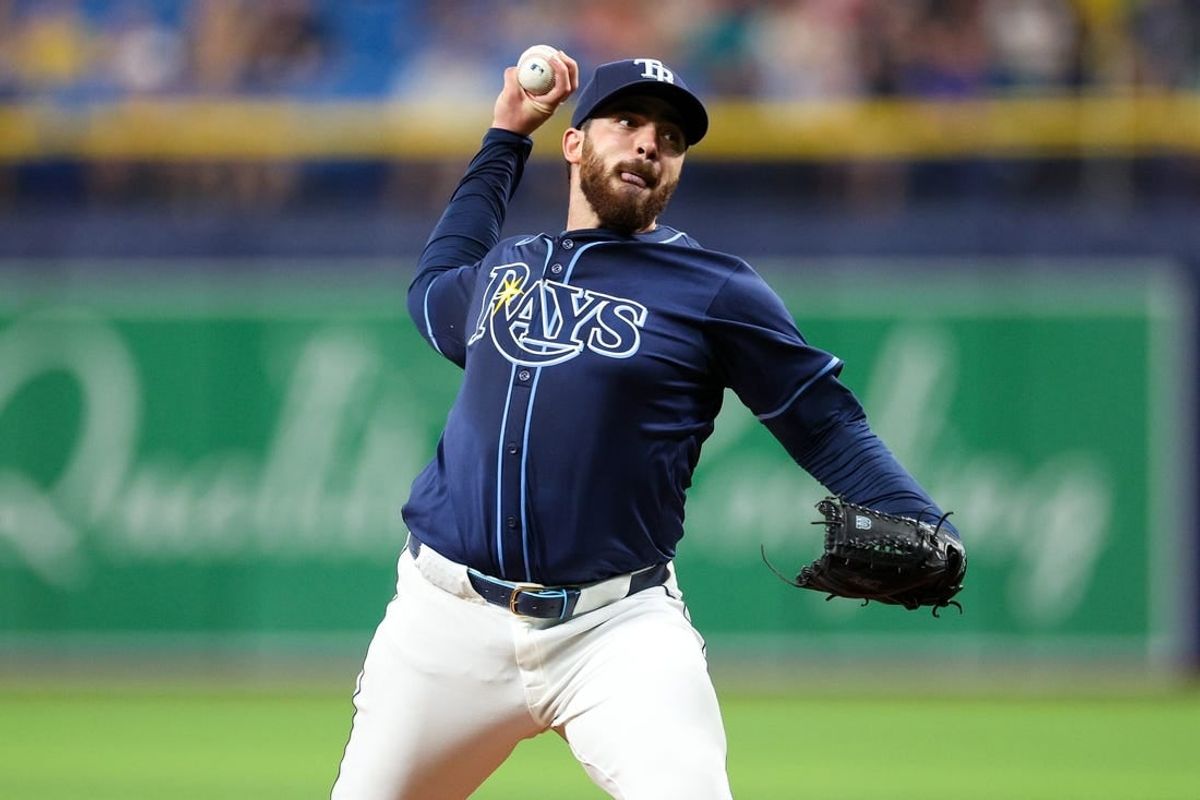 Apr 3, 2024; St. Petersburg, Florida, USA;  Tampa Bay Rays starting pitcher Aaron Civale (34) throws a pitch against the Texas Rangers in the first inning at Tropicana Field.