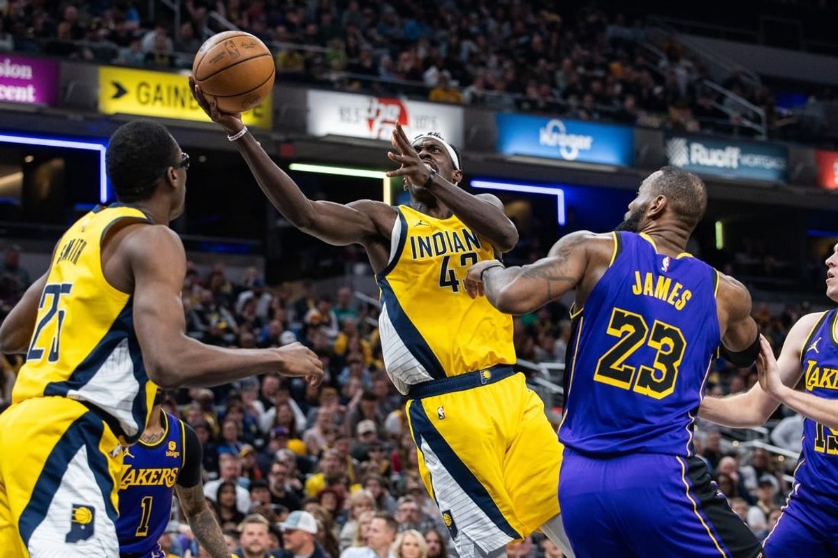 Mar 29, 2024; Indianapolis, Indiana, USA; Indiana Pacers forward Pascal Siakam (43) shoots the ball while Los Angeles Lakers forward LeBron James (23) defends in the first half at Gainbridge Fieldhouse.