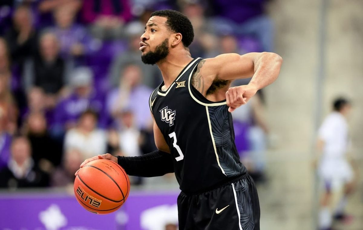 Mar 9, 2024; Fort Worth, Texas, USA;  UCF Knights guard Darius Johnson (3) reacts during the second half against the TCU Horned Frogs at Ed and Rae Schollmaier Arena.