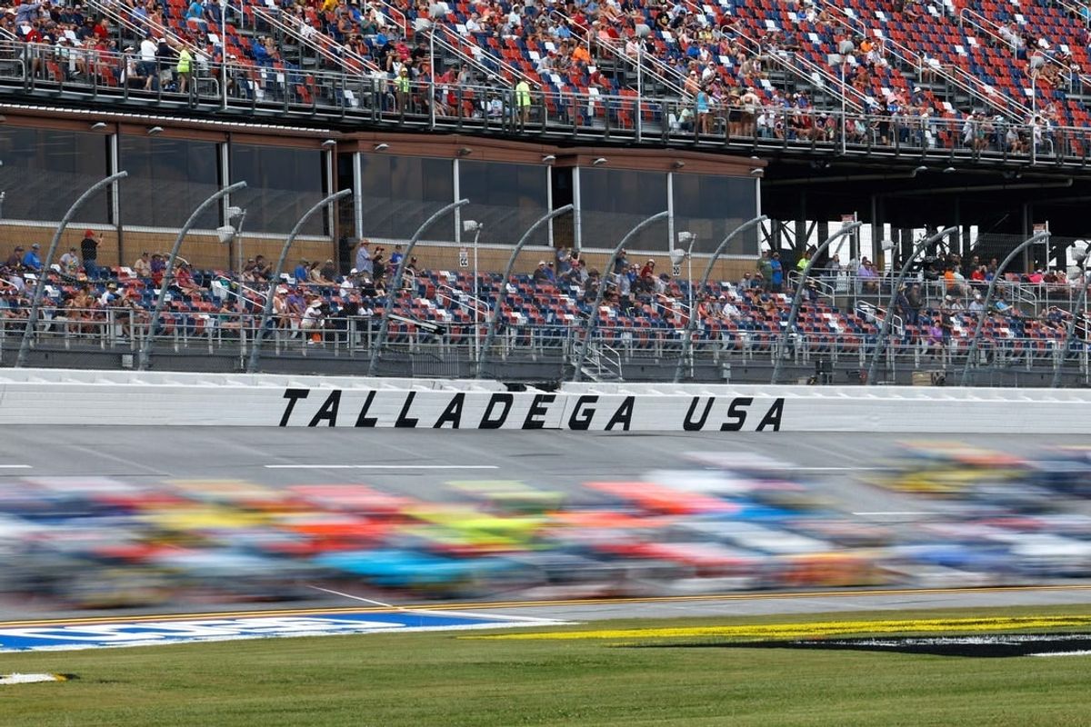 Sep 30, 2023; Talladega, Alabama, USA; General view of the pack passing a Talladega sign during the Love s RV Stop 250 at Talladega Superspeedway.