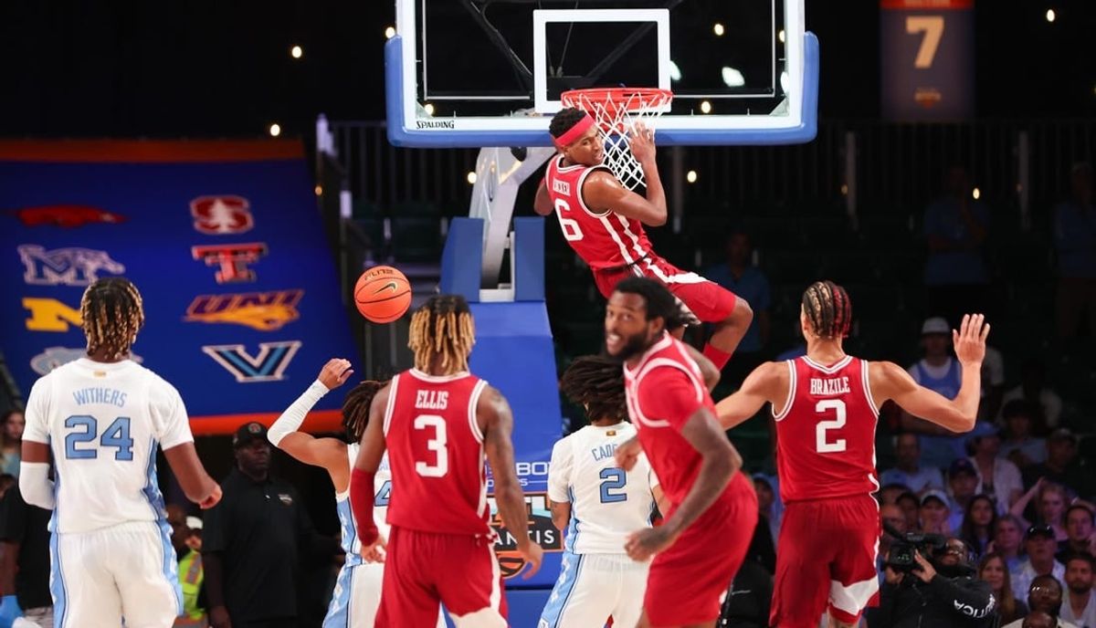 Nov 24, 2023; Paradise Island, BAHAMAS;  Arkansas Razorbacks guard Layden Blocker (6) dunks during the first half against the North Carolina Tar Heels at Imperial Arena.