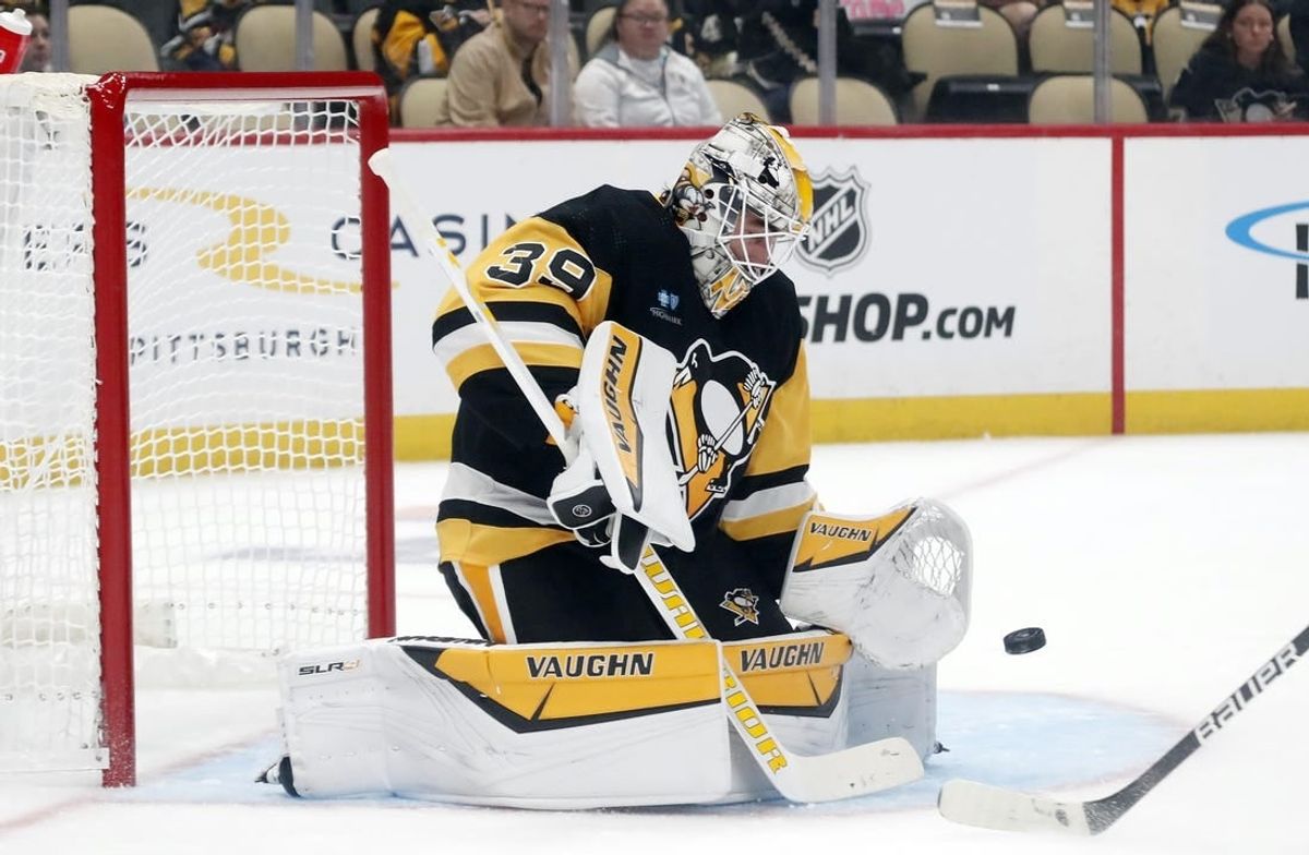 Sep 24, 2023; Pittsburgh, Pennsylvania, USA;  Pittsburgh Penguins goalie Alex Nedeljkovic (39) makes a save against the Columbus Blue Jackets during the first period at PPG Paints Arena.