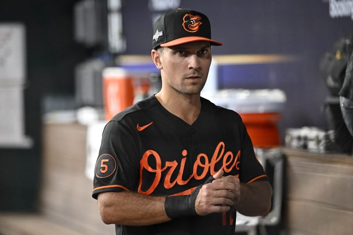 Oct 10, 2023; Arlington, Texas, USA; Baltimore Orioles second baseman Adam Frazier (12) in the dugout during warm ups before game three against the Texas Rangers in the ALDS for the 2023 MLB playoffs at Globe Life Field.