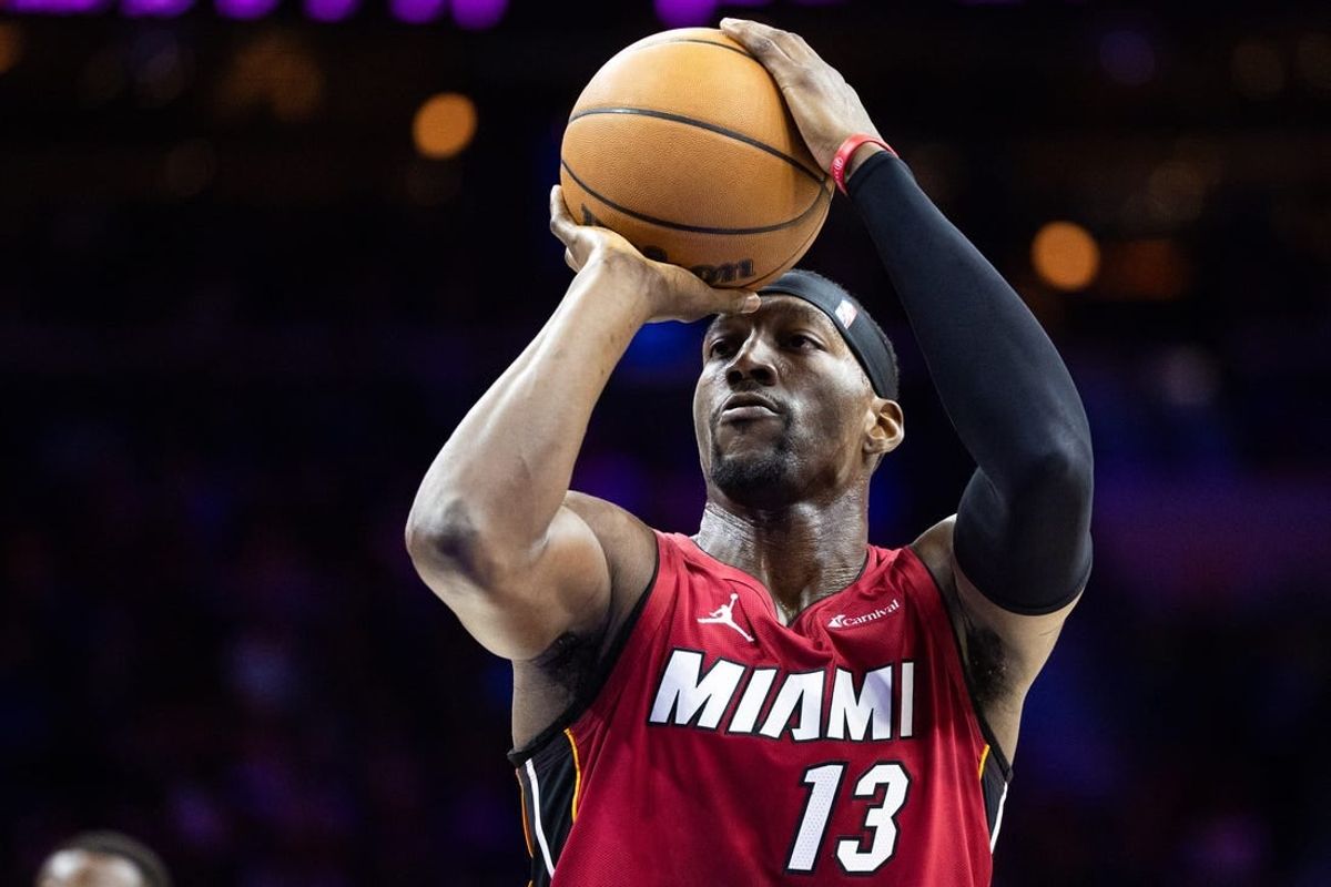 Mar 18, 2024; Philadelphia, Pennsylvania, USA; Miami Heat center Bam Adebayo (13) shoots a foul shot against the Philadelphia 76ers during the third quarter at Wells Fargo Center.