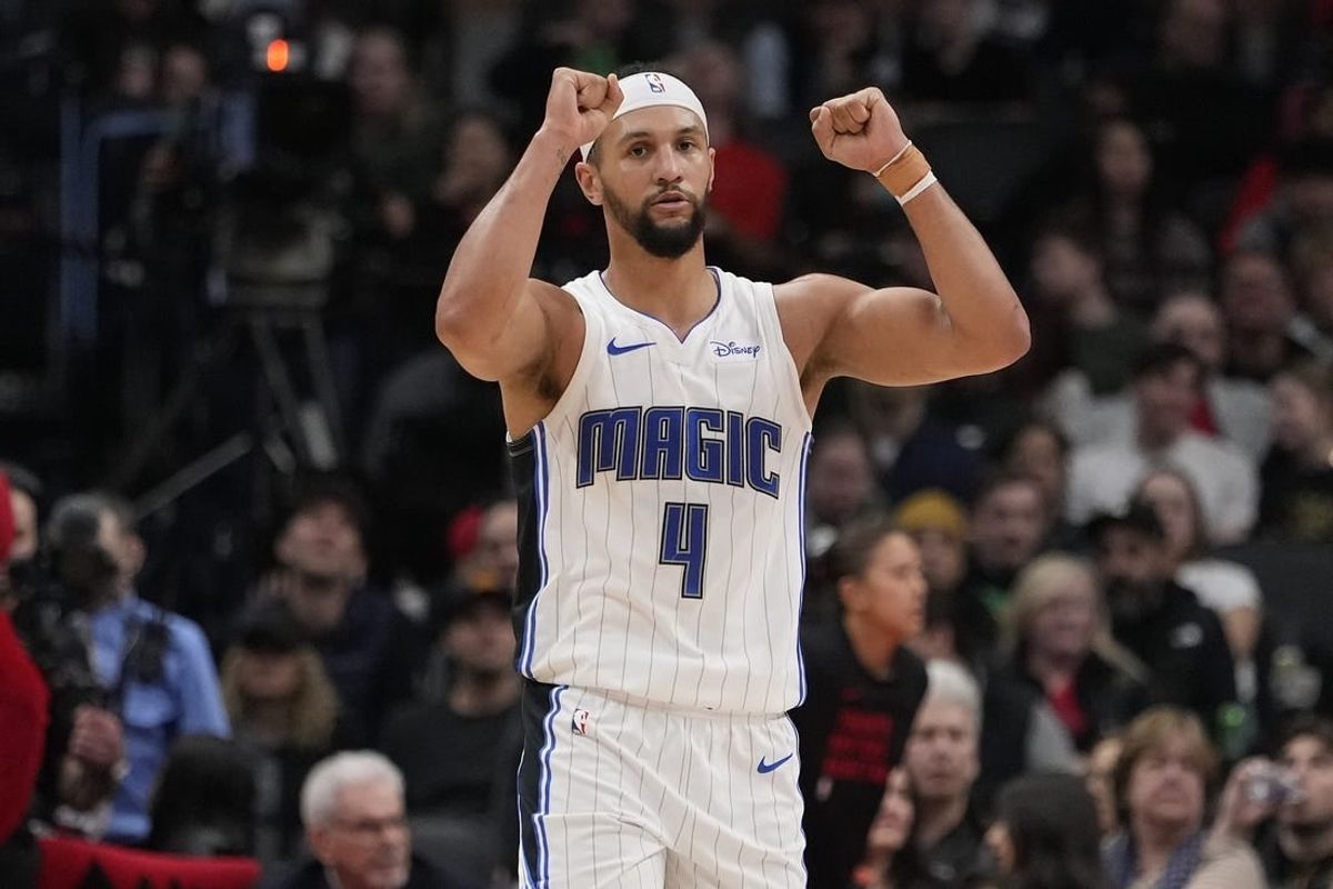 Mar 15, 2024; Toronto, Ontario, CAN; Orlando Magic guard Jalen Suggs (4) celebrates a play against the Toronto Raptors during the second half at Scotiabank Arena.