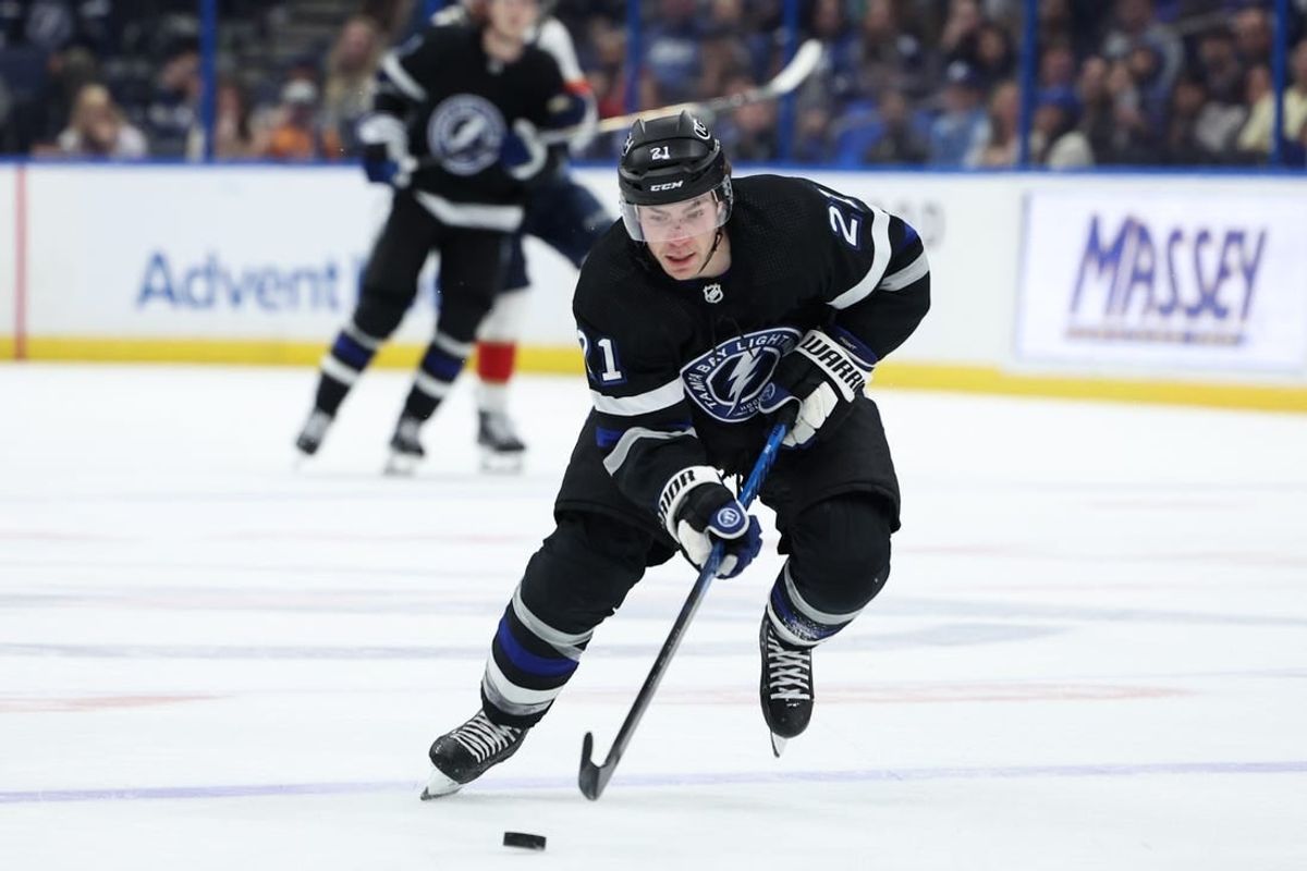 Feb 17, 2024; Tampa, Florida, USA;  Tampa Bay Lightning center Brayden Point (21) controls the puck against the Florida Panthers in the third period at Amalie Arena.