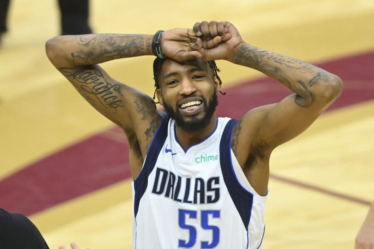 Feb 27, 2024; Cleveland, Ohio, USA; Dallas Mavericks forward Derrick Jones Jr. (55) reacts in the fourth quarter against the Cleveland Cavaliers at Rocket Mortgage FieldHouse.