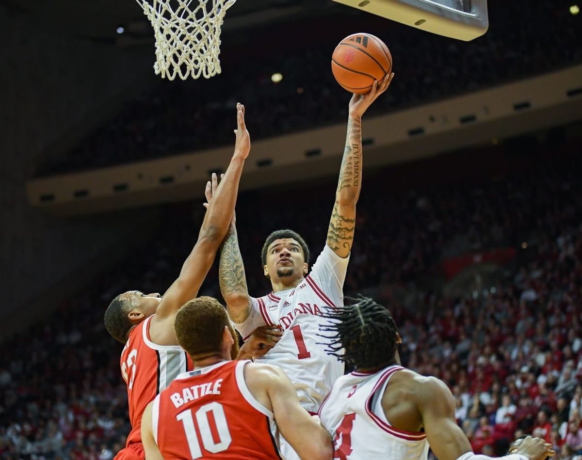 Jan 6, 2024; Bloomington, Indiana, USA; Indiana Hoosiers center Kel'el Ware (1) attempts a shot past Ohio State Buckeyes forward Zed Key (23) during the first half at Simon Skjodt Assembly Hall.