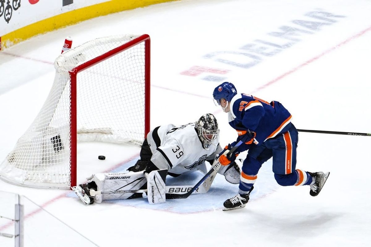 Dec 9, 2023; Elmont, New York, USA; New York Islanders center Jean-Gabriel Pageau (44) scores the game winning goal in overtime against Los Angeles Kings goaltender Cam Talbot (39) at UBS Arena.