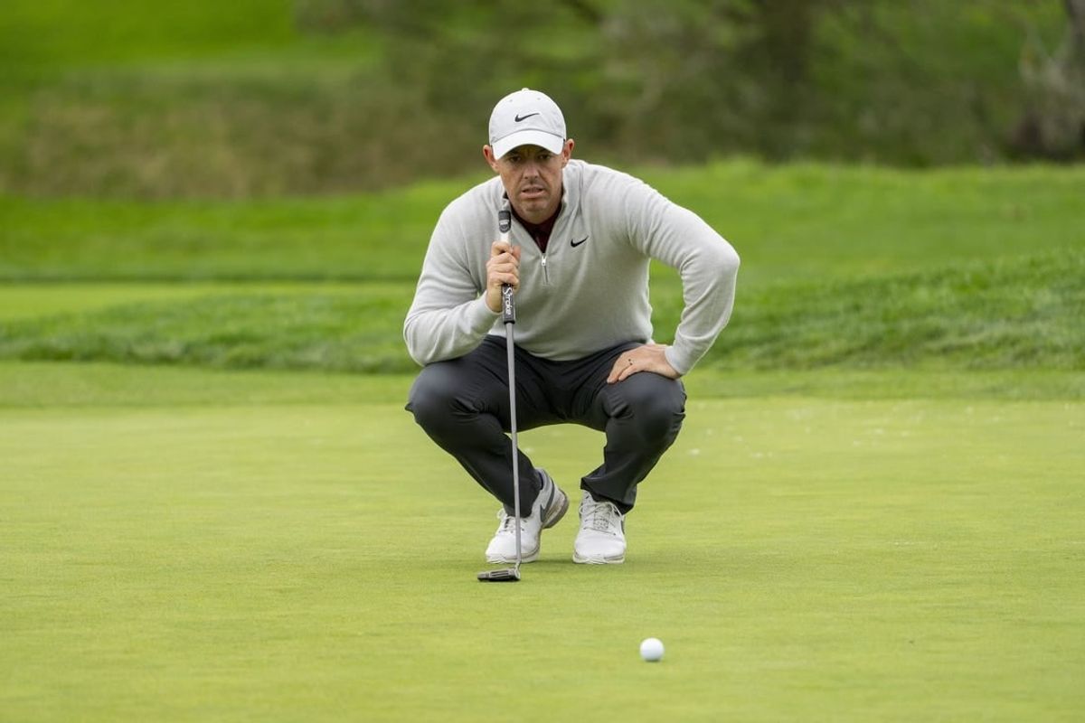 February 3, 2024; Pebble Beach, California, USA; Rory McIlroy lines up his putt on the second hole during the third round of the AT&T Pebble Beach Pro-Am golf tournament at Pebble Beach Golf Links.