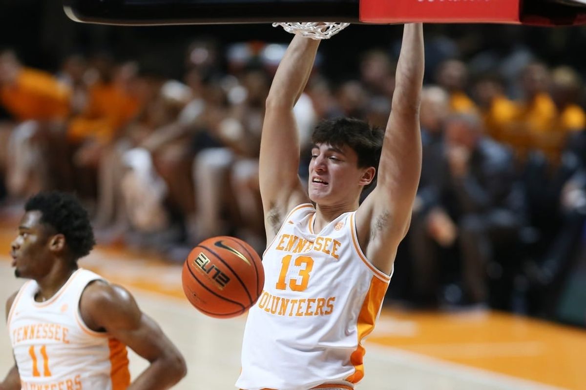 Dec 12, 2023; Knoxville, Tennessee, USA; Tennessee Volunteers forward J.P. Estrella (13) dunks the ball against the Georgia Southern Eagles at Food City Center at Thompson-Boling Arena.