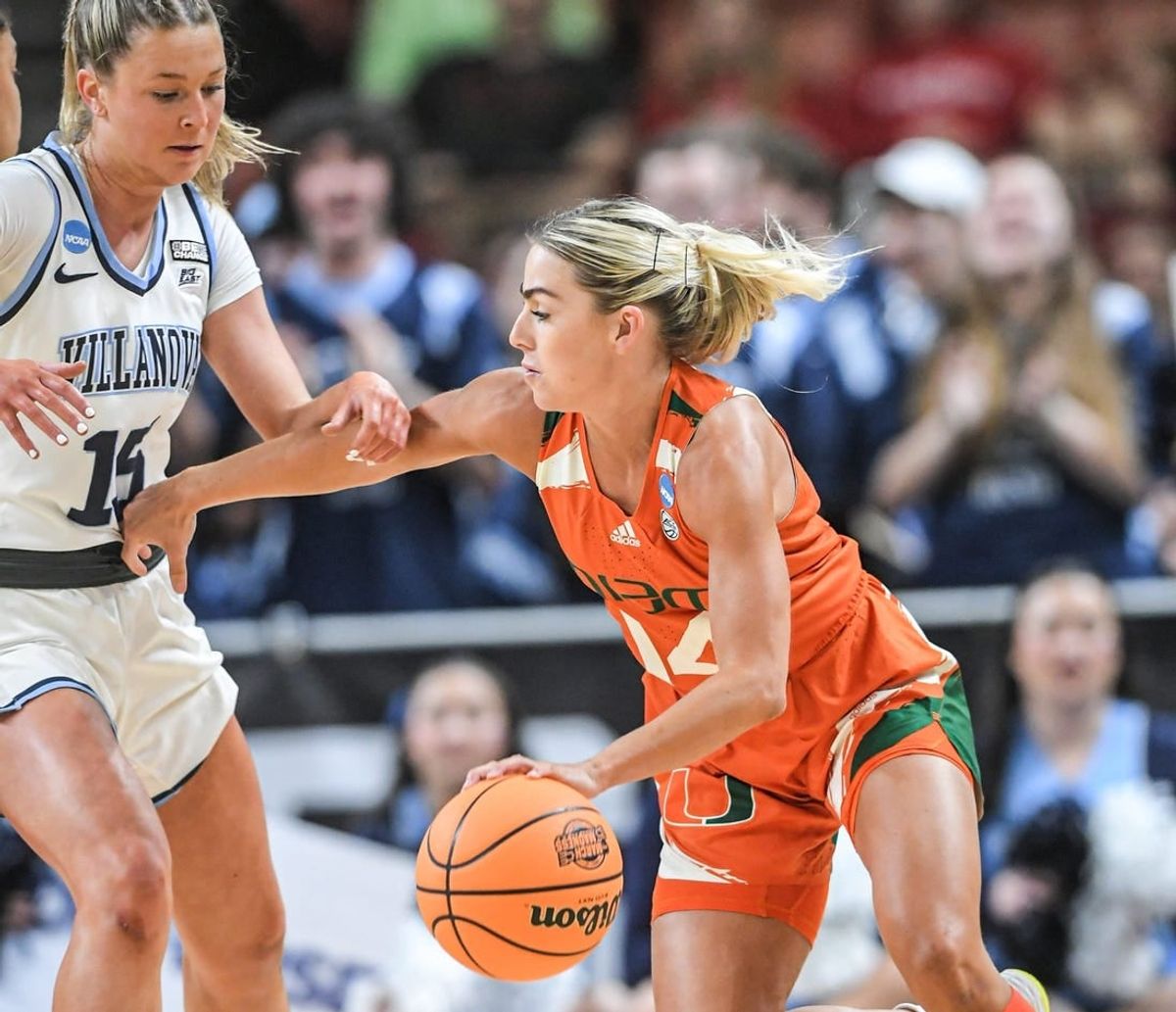 Villanova guard Brooke Mullin (15) guards Miami guard Haley Cavinder (14) during the first quarter of the Sweet 16 round of the NCAA Women's Tournament at Bon Secours Wellness Arena in Greenville, S.C. Friday, March 24, 2023.

Sweet 16 Round Of The Ncaa Women S Tournament