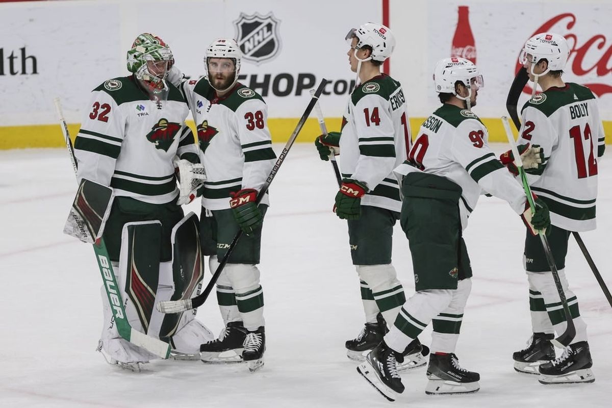 Jan 19, 2024; Sunrise, Florida, USA; Minnesota Wild goaltender Filip Gustavsson (32) celebrates with right wing Ryan Hartman (38), center Joel Eriksson Ek (14), Minnesota Wild left wing Marcus Johansson (90) and left wing Matt Boldy (12) after winning the game against the Florida Panthers at Amerant Bank Arena.