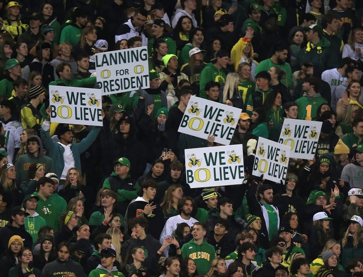 Duck fans show their support for Oregon quarterback Bo Nix and coach Dan Lanning during the game against Oregon State.