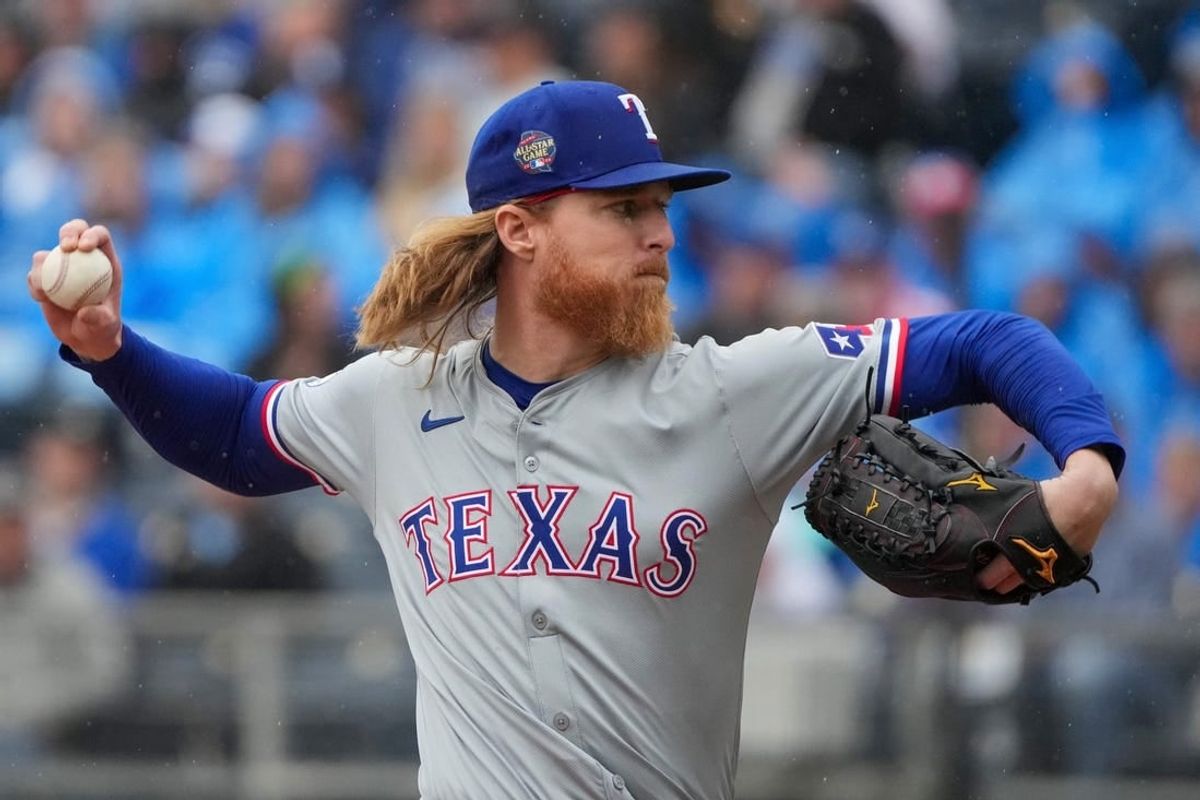 May 5, 2024; Kansas City, Missouri, USA; Texas Rangers pitcher Jon Gray (22) delivers a pitch against the Kansas City Royals in the first inning at Kauffman Stadium.