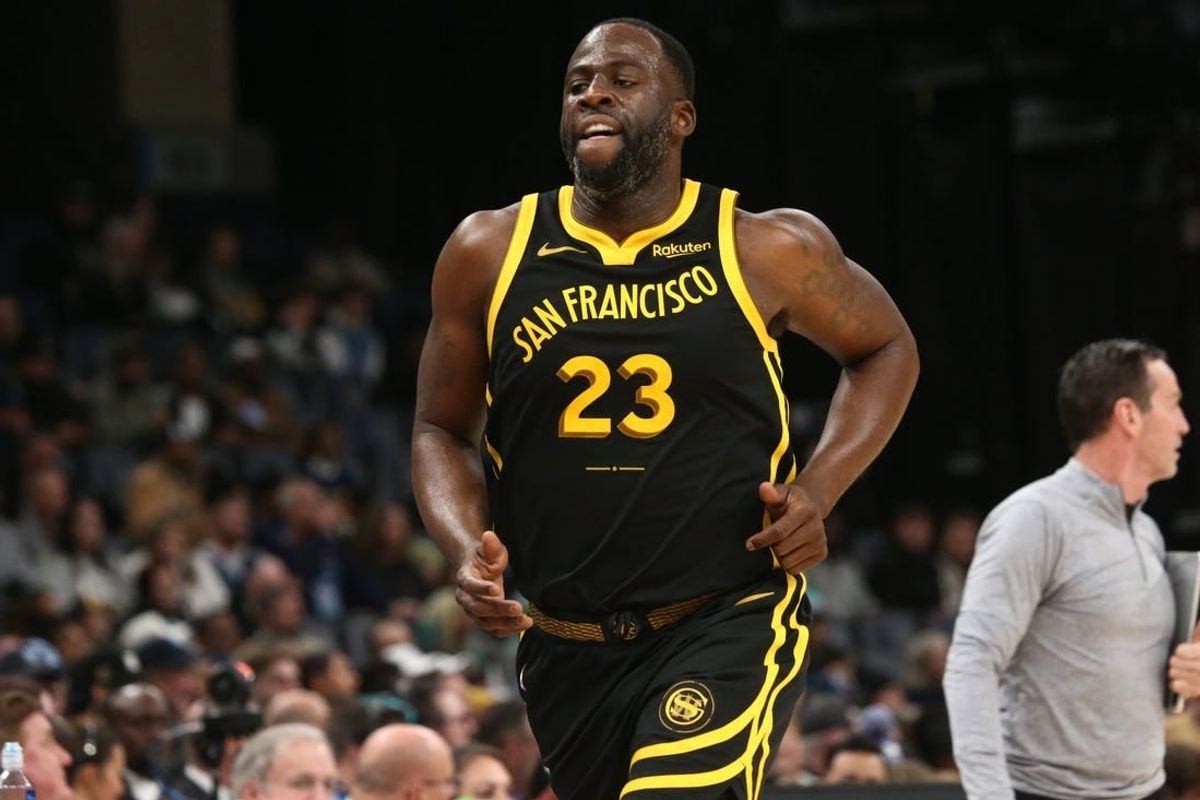 Jan 15, 2024; Memphis, Tennessee, USA; Golden State Warriors forward Draymond Green (23) runs toward the bench during the second half against the Memphis Grizzlies  at FedExForum.