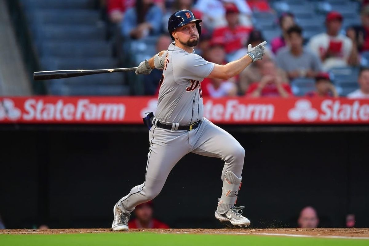 Sep 15, 2023; Anaheim, California, USA; Detroit Tigers third baseman Andre Lipcius (27) hits an RBI double against the Los Angeles Angels during the first inning at Angel Stadium.