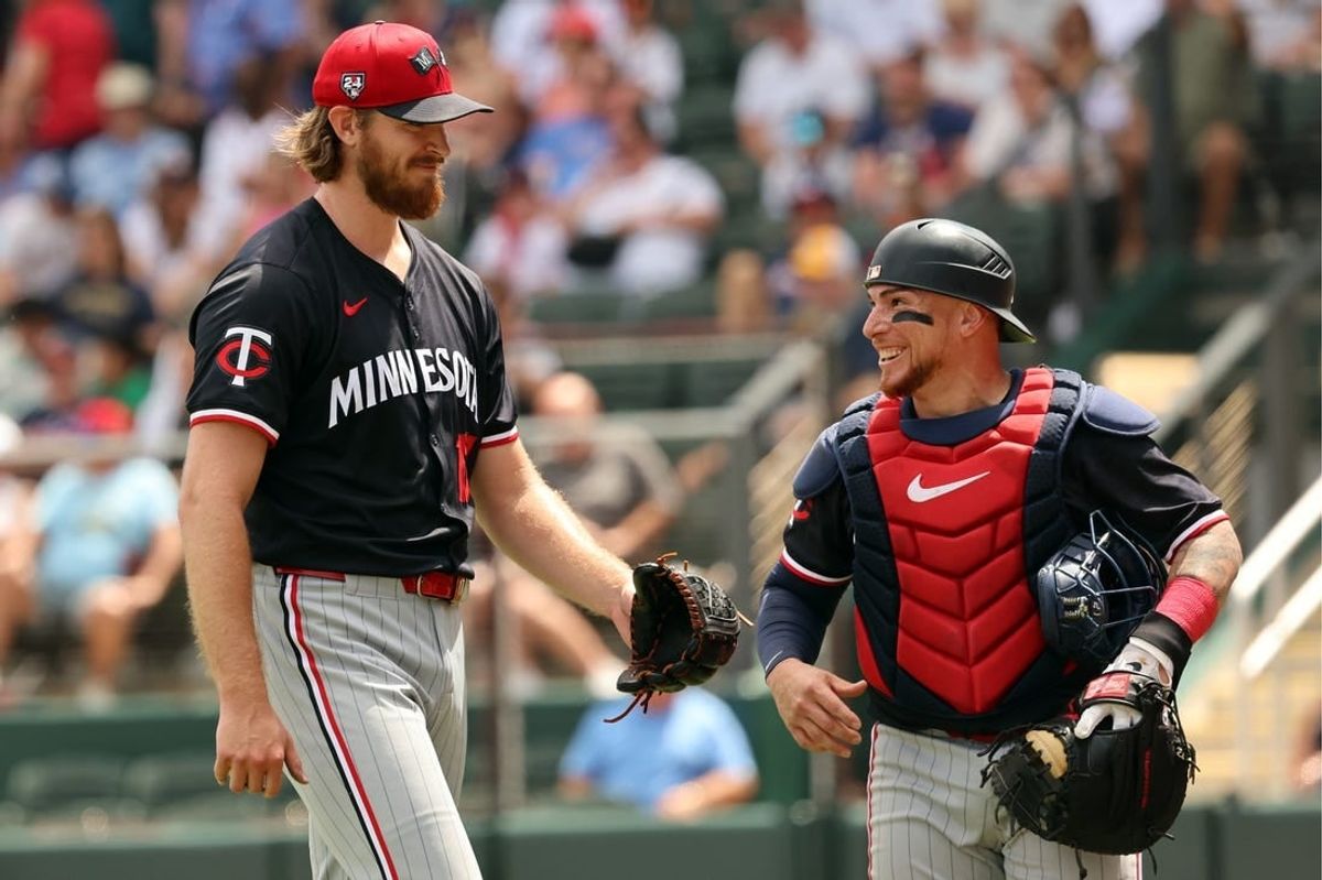Mar 25, 2024; North Port, Florida, USA;  Minnesota Twins starting pitcher Bailey Ober (17) and catcher Christian Vazquez (8) smile at the end of the fourth inning against the Atlanta Braves at CoolToday Park.