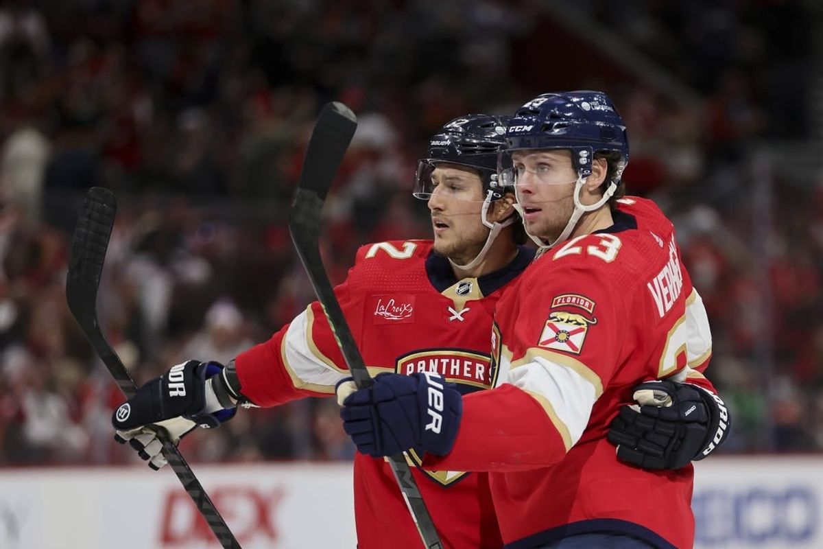Jan 15, 2024; Sunrise, Florida, USA; Florida Panthers center Carter Verhaeghe (23) celebrates with center Sam Reinhart (13) after scoring against the Anaheim Ducks during the second period at Amerant Bank Arena.