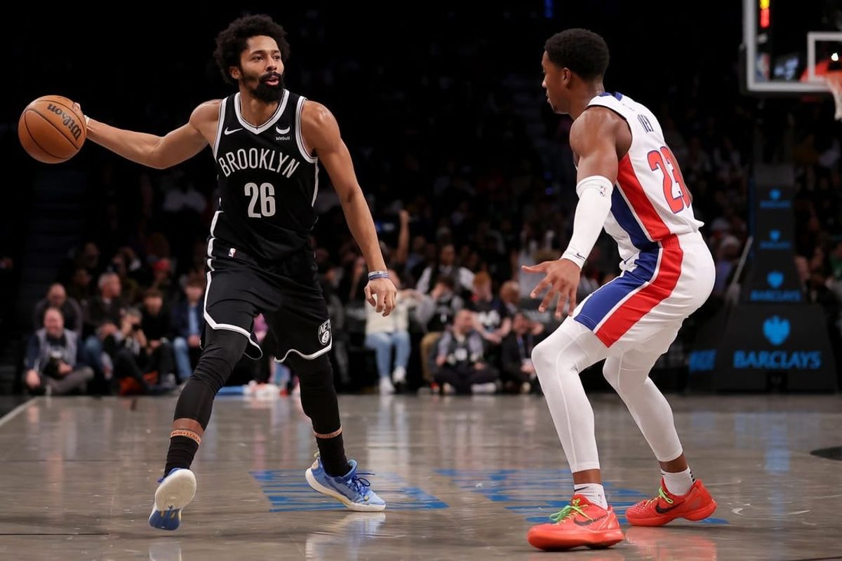Dec 23, 2023; Brooklyn, New York, USA; Brooklyn Nets guard Spencer Dinwiddie (26) looks to pass the ball against Detroit Pistons guard Jaden Ivey (23) during the second quarter at Barclays Center.