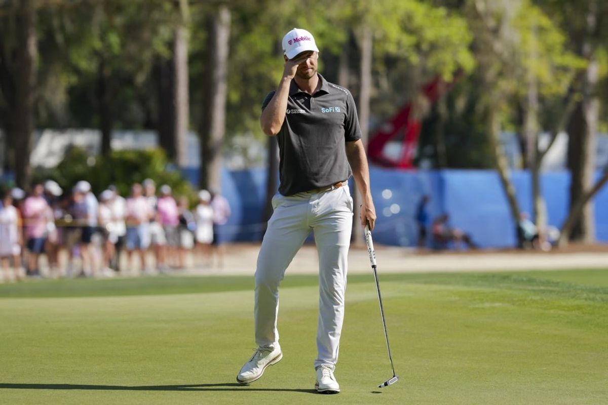 Apr 19, 2024; Hilton Head, South Carolina, USA; Wyndham Clark reacts to missing his putt on the 15th green during the second round of the RBC Heritage golf tournament.