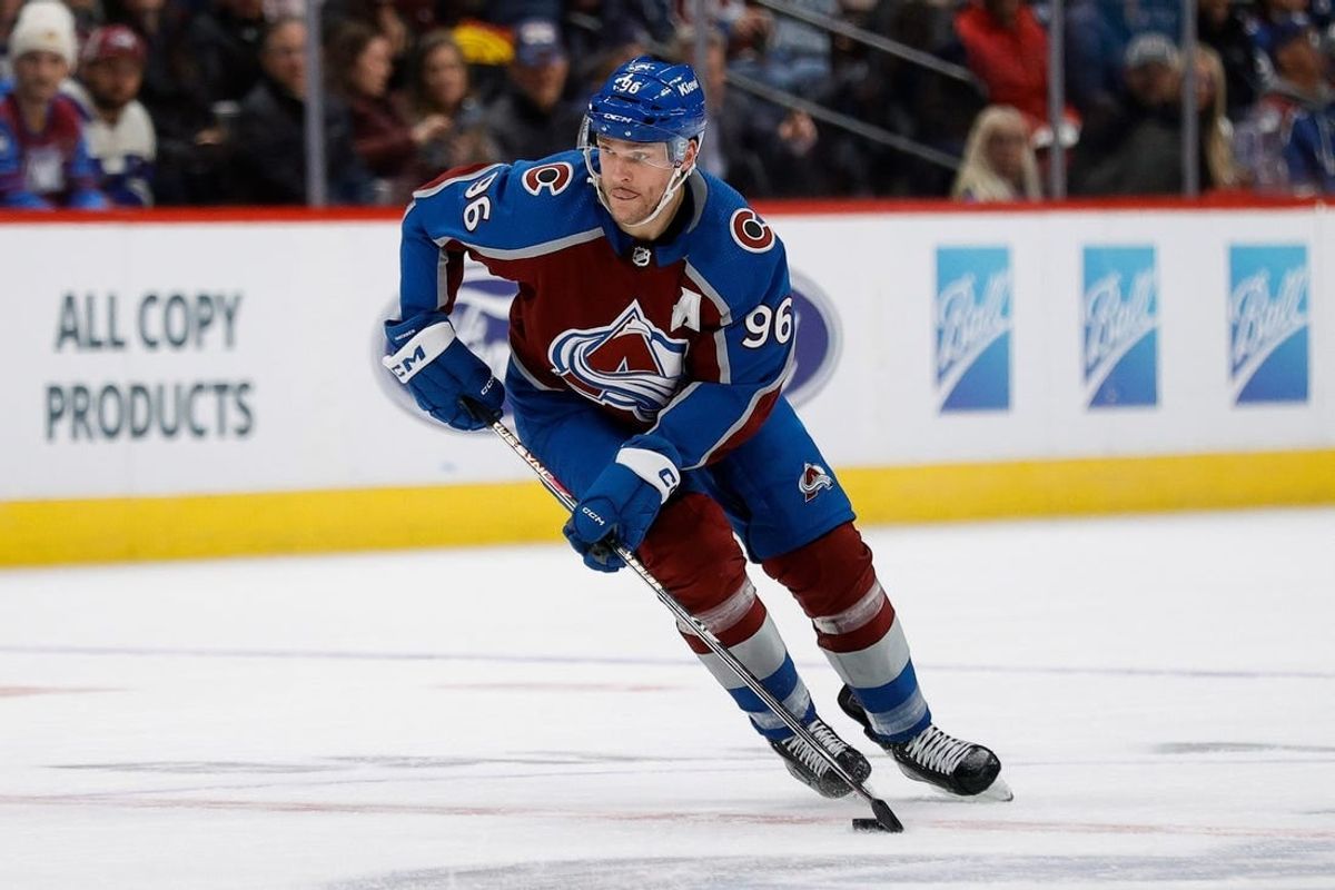 Dec 5, 2023; Denver, Colorado, USA; Colorado Avalanche right wing Mikko Rantanen (96) controls the puck in the second period against the Anaheim Ducks at Ball Arena.