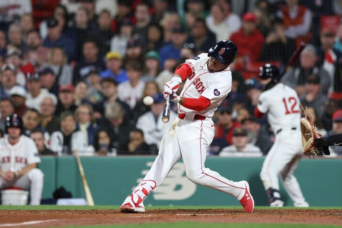 Apr 16, 2024; Boston, Massachusetts, USA; Boston Red Sox second baseman Enmanuel Valdez (47) hits a solo home run during the fourth inning against the Cleveland Guardians at Fenway Park.