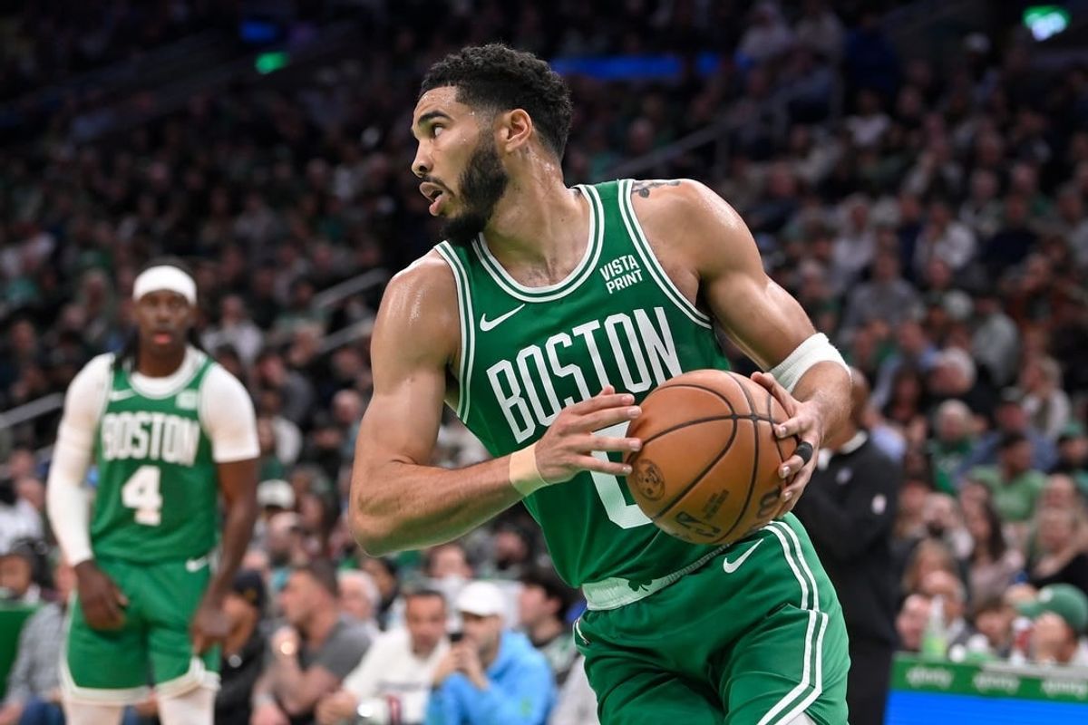 Apr 5, 2024; Boston, Massachusetts, USA; Boston Celtics forward Jayson Tatum (0) grabs the rebound against the Sacramento Kings during the second half at TD Garden.