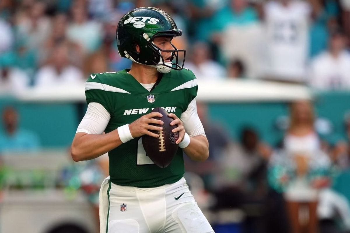 Dec 17, 2023; Miami Gardens, Florida, USA; New York Jets quarterback Zach Wilson (2) drops back to attempt a pass against the Miami Dolphins during the first half at Hard Rock Stadium.