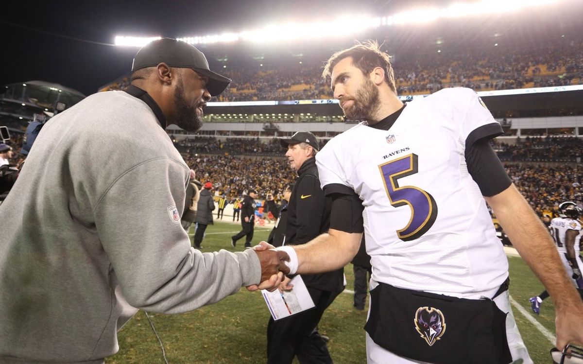 Dec 25, 2016; Pittsburgh, PA, USA;  Pittsburgh Steelers head coach Mike Tomlin (left) shakes hands with Baltimore Ravens quarterback Joe Flacco (5) after their game at Heinz Field. The Steelers won 31-27. Mandatory Credit: Charles LeClaire-Imagn Images
