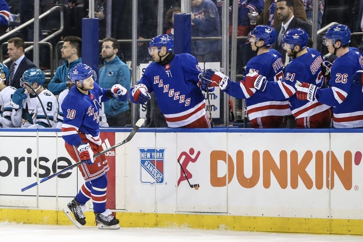 Dec 3, 2023; New York, New York, USA; New York Rangers left wing Artemi Panarin (10) is greeted by his teammates after scoring a goal in the first period against the San Jose Sharks at Madison Square Garden.