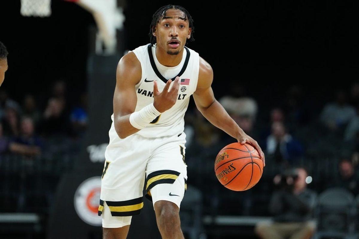 Nov 23, 2023; Las Vegas, Nevada, USA; Vanderbilt Commodores guard Tyrin Lawrence (0) dribbles against the North Carolina State Wolfpack during the first half at Michelob Ultra Arena.