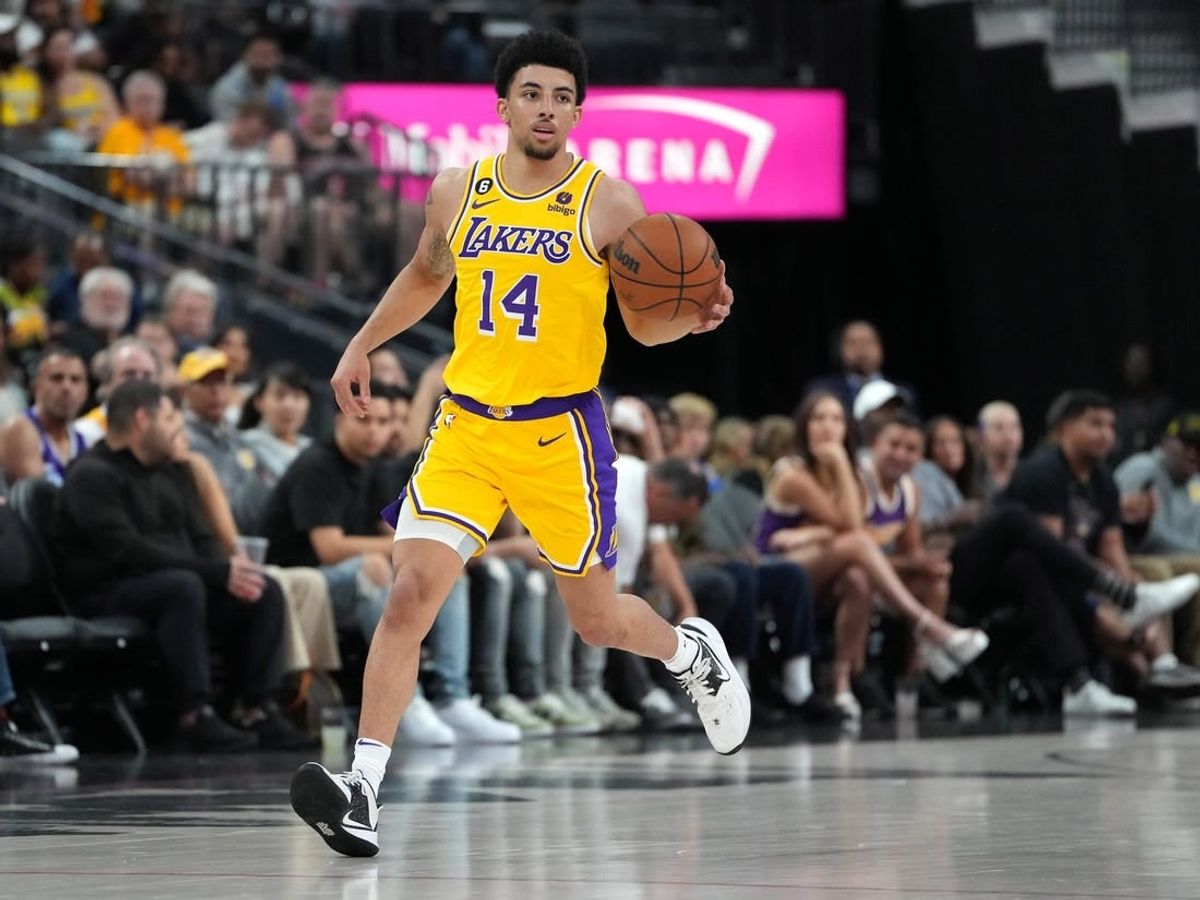 Oct 6, 2022; Las Vegas, Nevada, USA; Los Angeles Lakers guard Scotty Pippen Jr. (14) dribbles against the Minnesota Timberwolves during a preseason game at T-Mobile Arena.