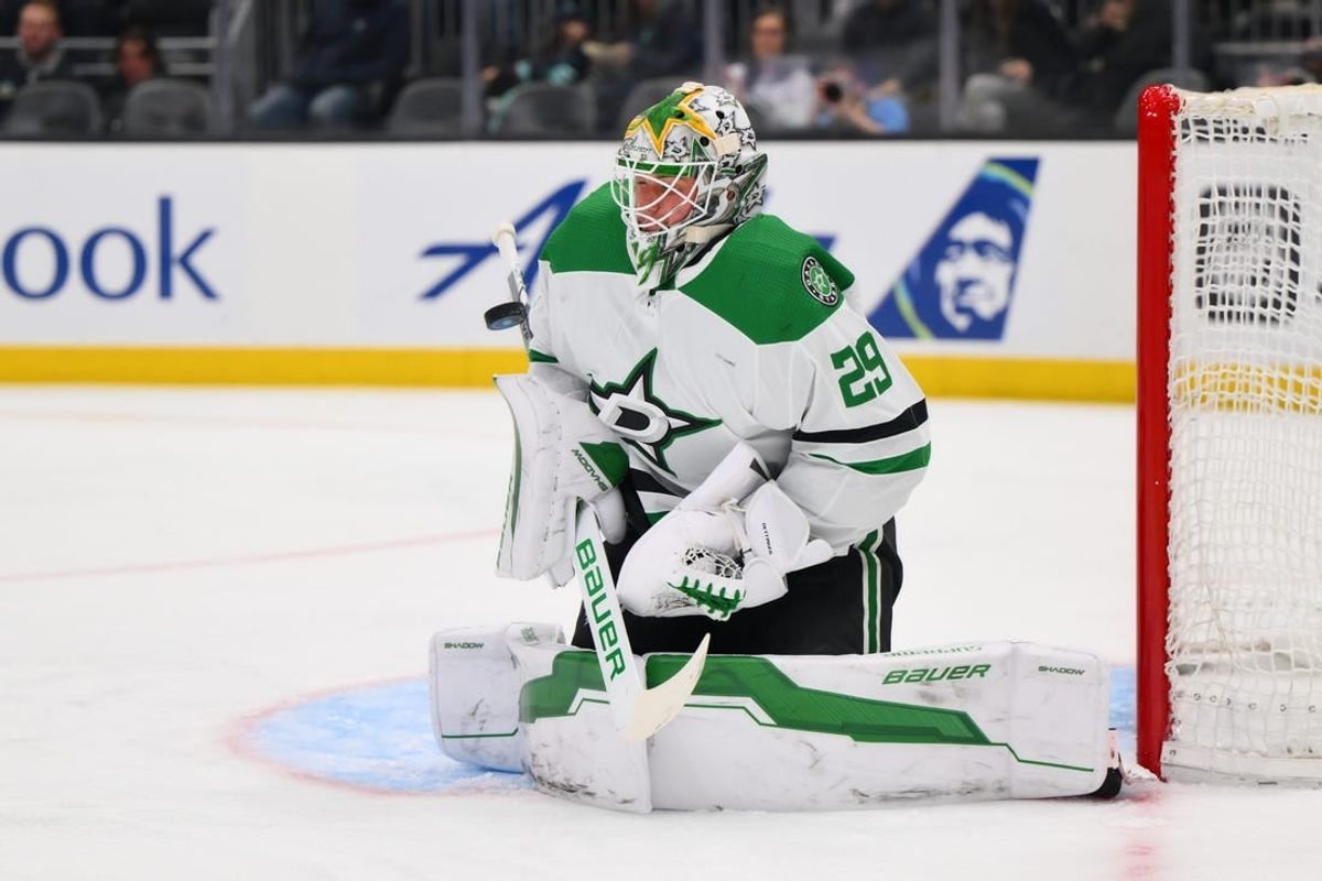 Mar 30, 2024; Seattle, Washington, USA; Dallas Stars goaltender Jake Oettinger (29) blocks a goal shot against the Seattle Kraken during the second period at Climate Pledge Arena.