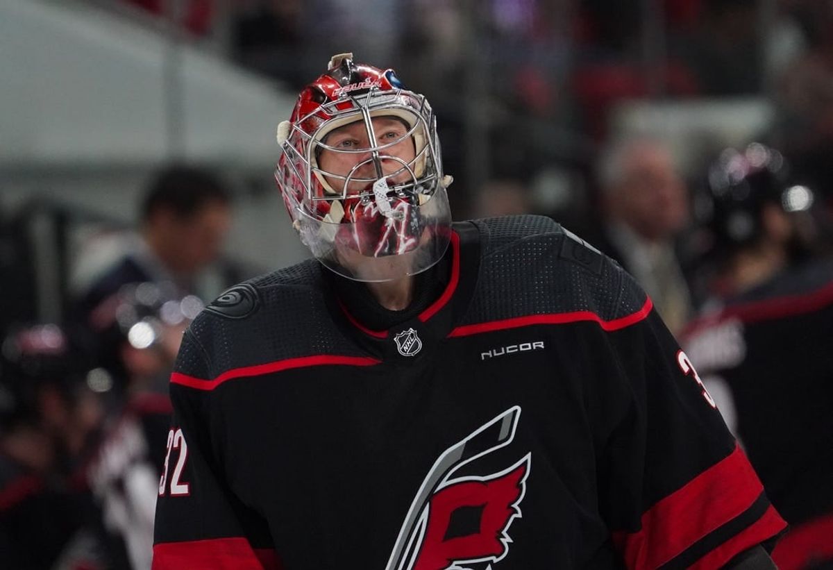 Jan 27, 2024; Raleigh, North Carolina, USA; Carolina Hurricanes goaltender Antti Raanta (32) looks on against the Arizona Coyotes during the second period at PNC Arena.