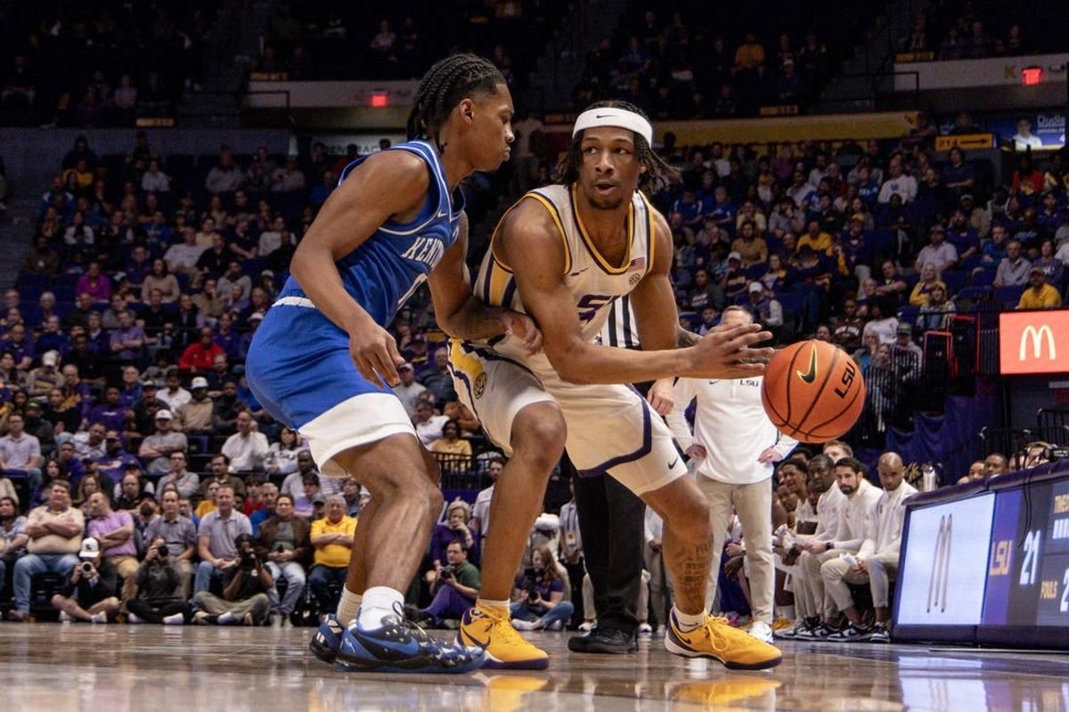 Feb 21, 2024; Baton Rouge, Louisiana, USA; LSU Tigers guard Mike Williams III (2) dribbles against the Kentucky Wildcats  during the first half of the game at Pete Maravich Assembly Center.