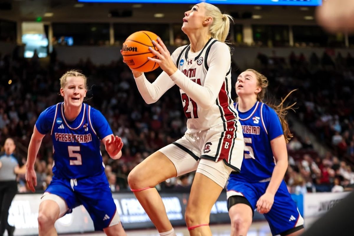 Mar 22, 2024; Columbia, SC, USA; South Carolina Gamecocks forward Chloe Kitts (21) drives against the Presbyterian Blue Hose in the first half at Colonial Life Arena.