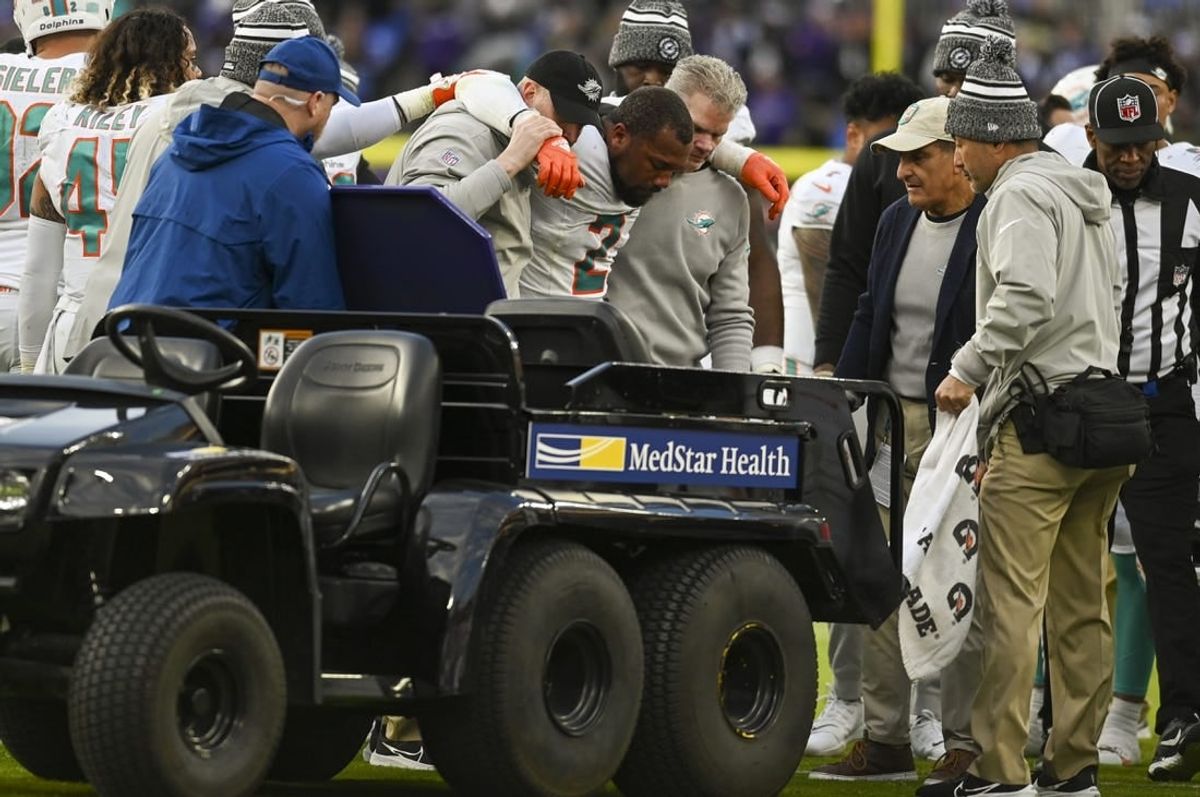 Dec 31, 2023; Baltimore, Maryland, USA;  Miami Dolphins linebacker Bradley Chubb (2) ins helped to the cart after being injured during the second  half against the Baltimore Ravens at M&T Bank Stadium.Baltimore Ravens defeated Miami Dolphins 56-19.