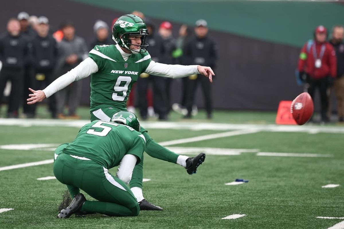 Dec 24, 2023; East Rutherford, New Jersey, USA; New York Jets place kicker Greg Zuerlein (9) kicks a field goal as punter Thomas Morstead (5) holds during the first half against the Washington Commanders at MetLife Stadium.