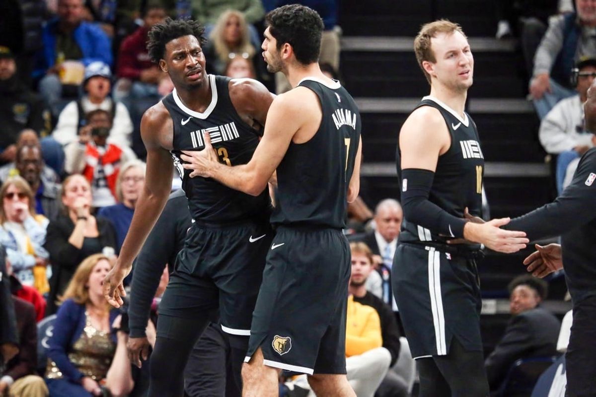 Nov 10, 2023; Memphis, Tennessee, USA; Memphis Grizzlies forward-center Jaren Jackson Jr. (13) held back by forward-center Santi Aldama (7) after being called for two technical fouls during the second half against the Utah Jazz at FedExForum.