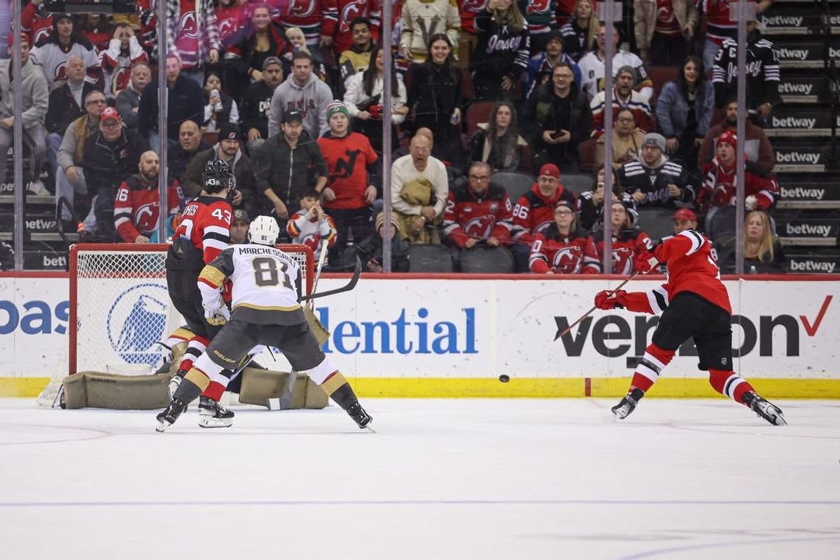 Jan 22, 2024; Newark, New Jersey, USA; New Jersey Devils right wing Tyler Toffoli (73) scores the game-winning goal in overtime against Vegas Golden Knights goaltender Logan Thompson (36) in front of Golden Knights right wing Jonathan Marchessault (81) and defenseman Luke Hughes (43) at Prudential Center.