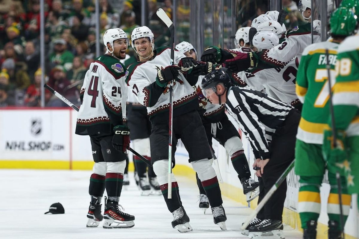 Jan 13, 2024; Saint Paul, Minnesota, USA; Arizona Coyotes center Nick Bjugstad (17) celebrates his hat-trick against the Minnesota Wild during the second period at Xcel Energy Center.