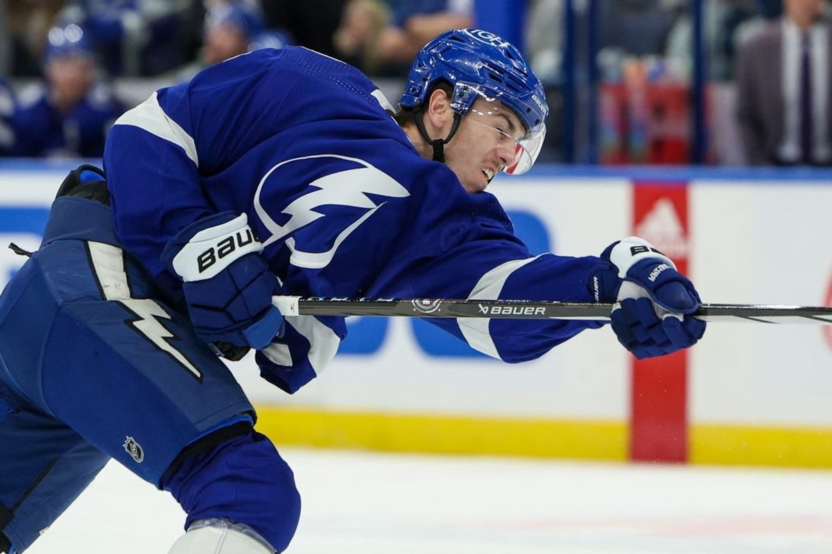 Feb 22, 2024; Tampa, Florida, USA;  Tampa Bay Lightning defenseman Haydn Fleury (7) shoots the puck against the Washington Capitals in the first period at Amalie Arena.