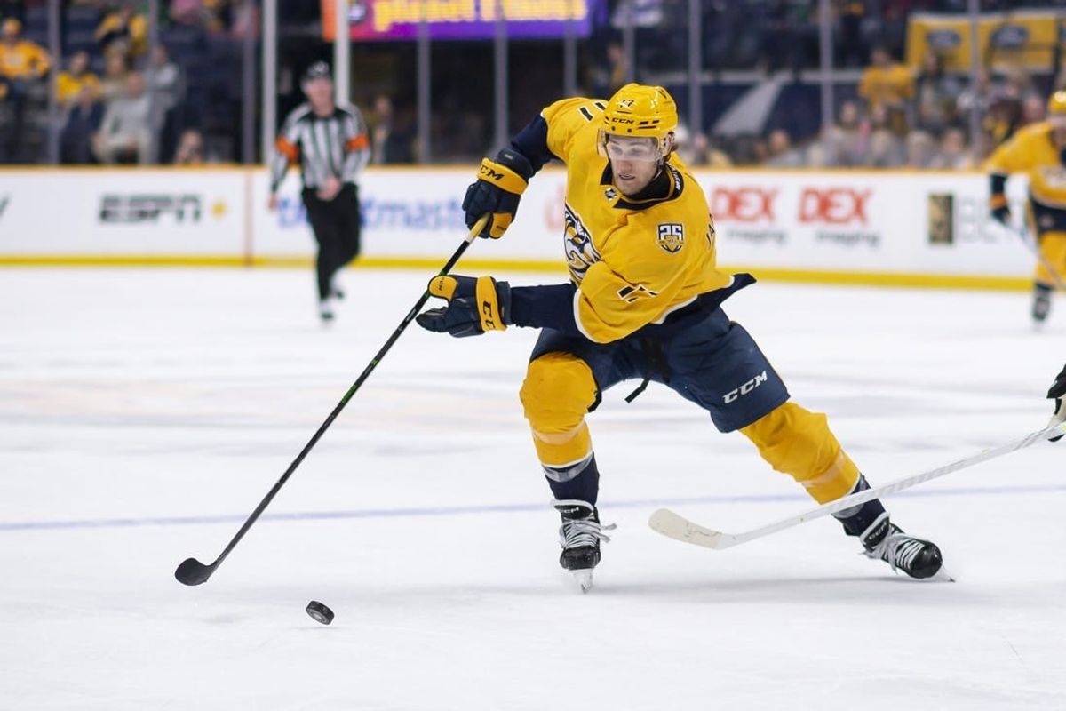Feb 15, 2024; Nashville, Tennessee, USA; Nashville Predators left wing Mark Jankowski (17) skates with the puck  during the third period at Bridgestone Arena.