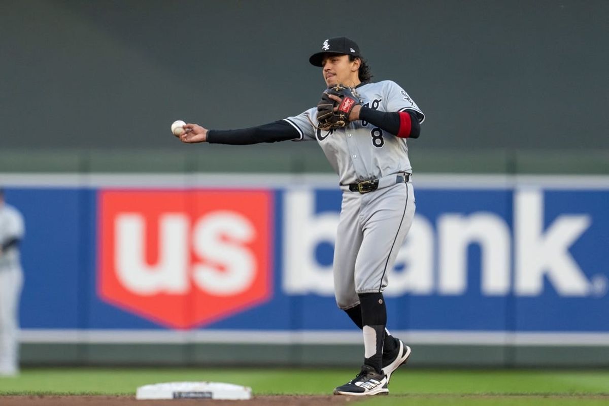 Apr 23, 2024; Minneapolis, Minnesota, USA; Chicago White Sox second baseman Nicky Lopez (8) throws after pitcher Erick Fedde (not pictured) strikes out Minnesota Twins outfielder Alex Kirilloff (not pictured) in the third inning at Target Field.