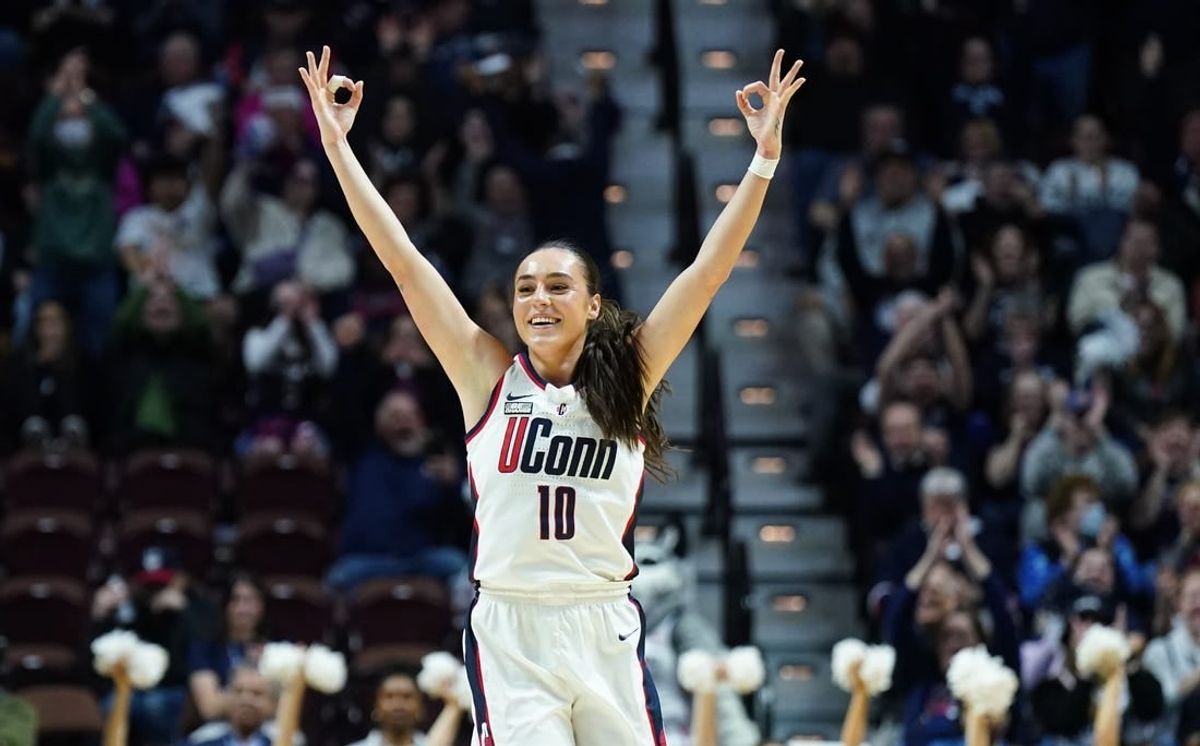 Mar 11, 2024; Uncasville, CT, USA; UConn Huskies guard Nika Muhl (10) reacts after a three point basket against the Georgetown Hoyas in the first half at Mohegan Sun Arena.