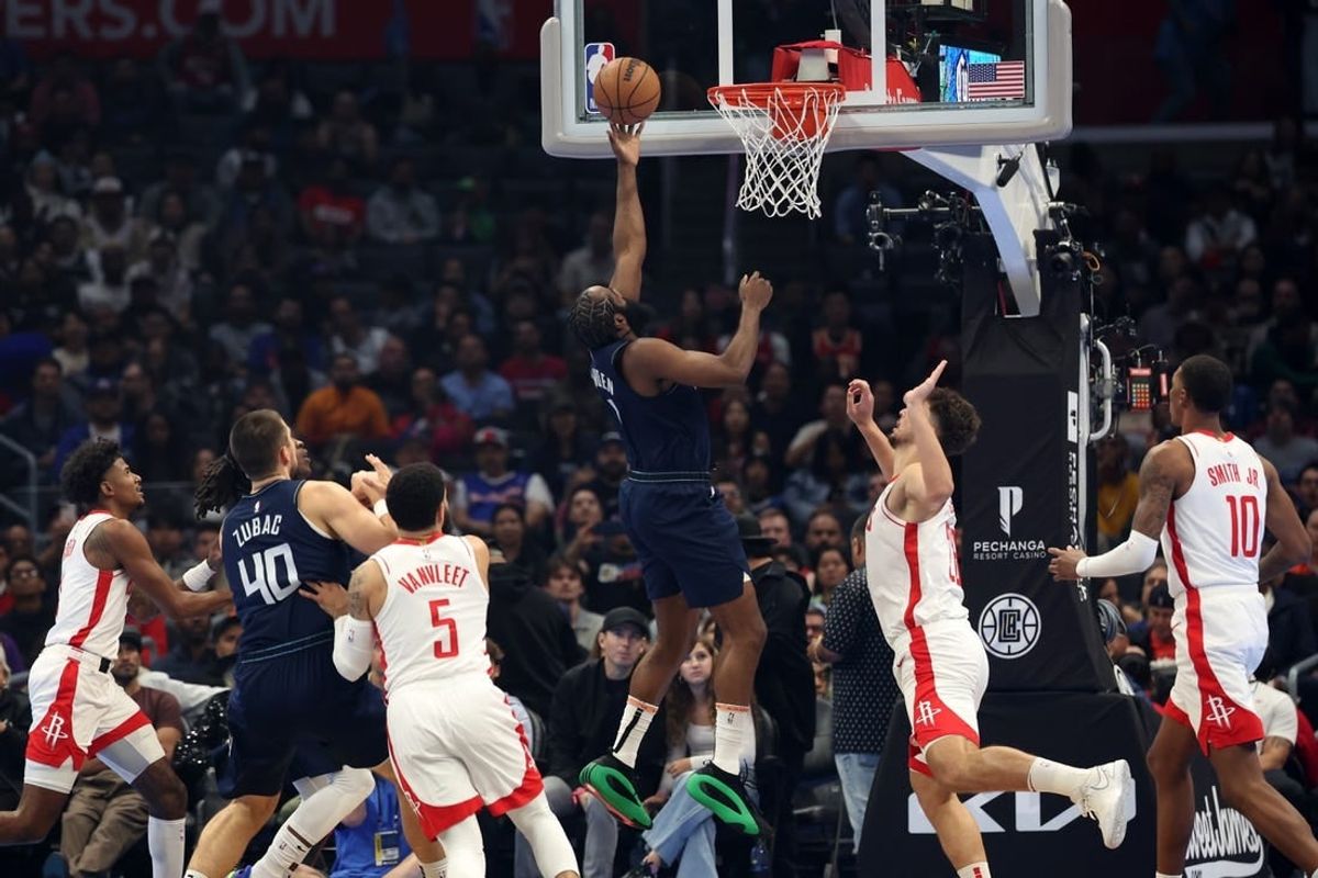 Nov 17, 2023; Los Angeles, California, USA;  L.A. Clippers guard James Harden (1) drives to the basket during the first quarter against the Houston Rockets at Crypto.com Arena.