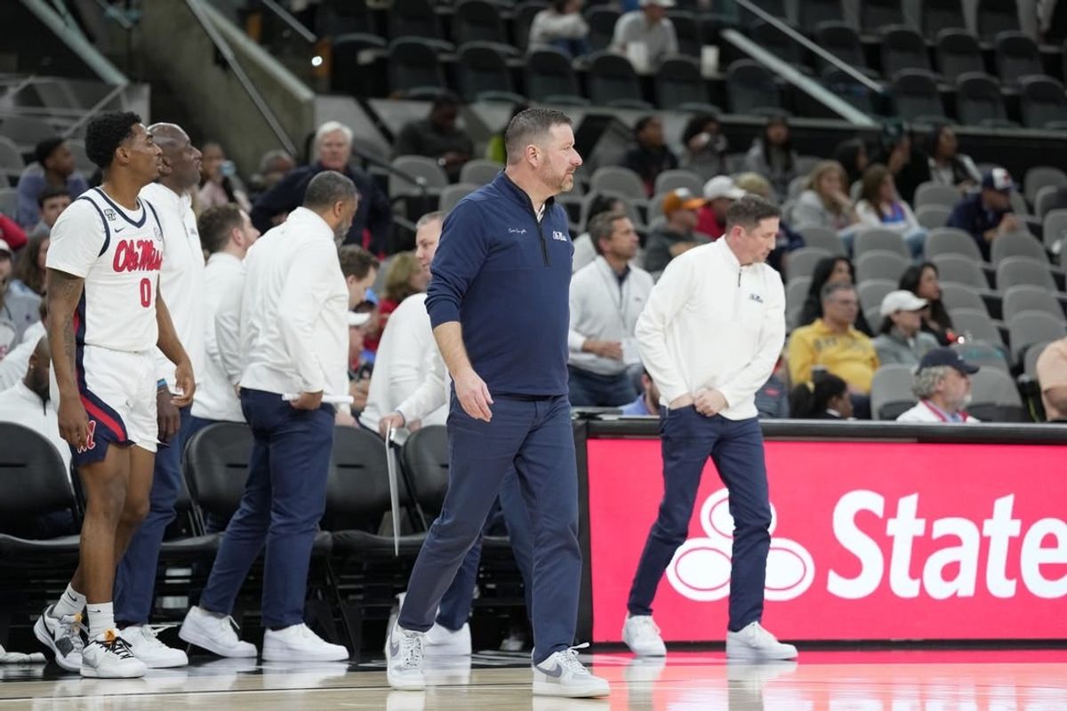 Dec 16, 2023; San Antonio, Texas, USA; Mississippi Rebels head coach Chris Beard looks on during the first half against the California Golden Bears at the Frost Bank Center.