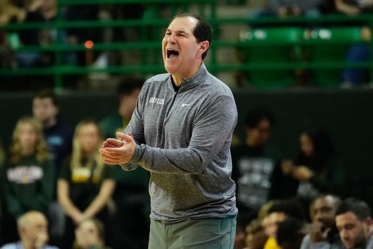 Dec 2, 2023; Waco, Texas, USA;  Baylor Bears head coach Scott Drew congratulates his team after a play against the Northwestern State Demons during the first half at Ferrell Center.